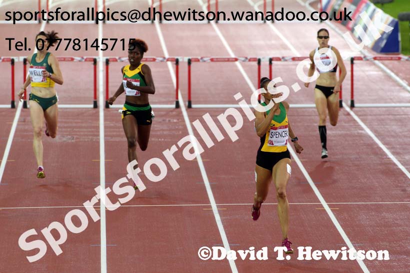 Kaliese Spencer (Jamaica) wins the 400 metres hurdles at the Commonwealth Games, Glasgow. Photo: David T. Hewitson/Sports for All Pics